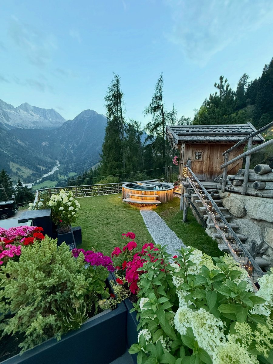 The garden at Chalet Al Fos, hot tub included